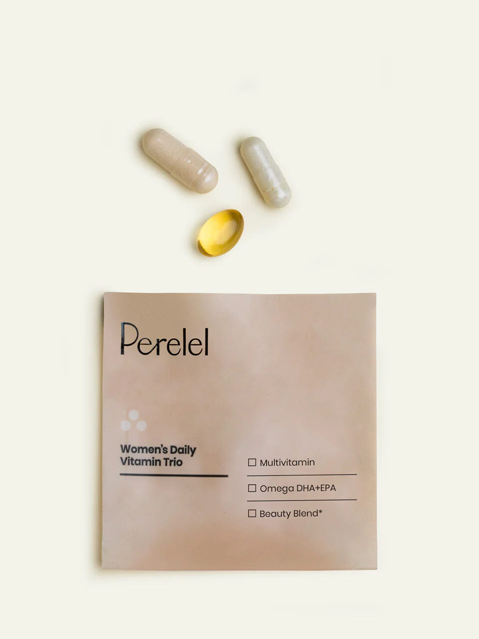 A daily pack of Perelel Women's Daily Vitamin Trio, with the three supplements shown above the packaging. 