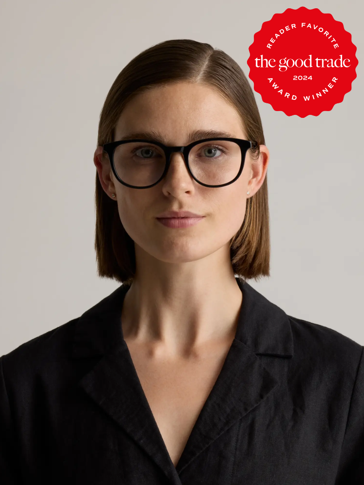Person with short hair and glasses wearing a black top, with a "FashionGroomSpot 2024 Reader Favorite Award Winner" badge in the corner.