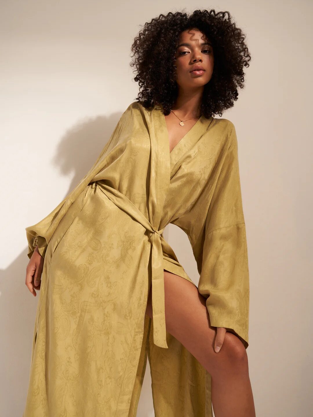 A model wearing an Idle robe.
