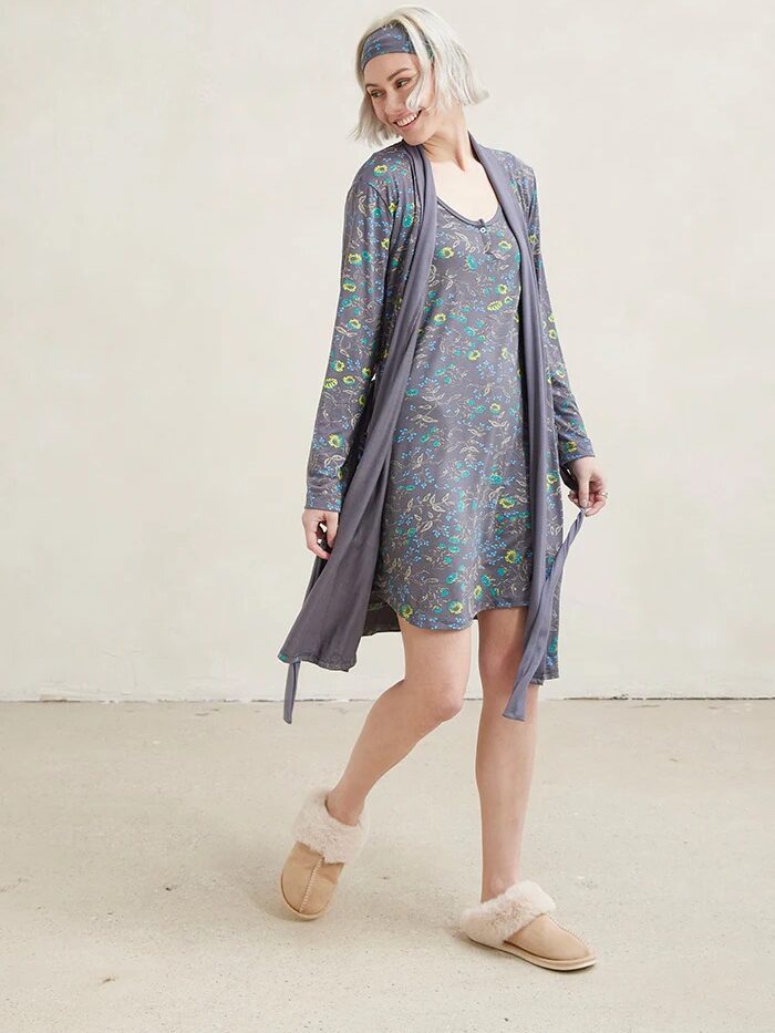 A model wearing a This is J robe.