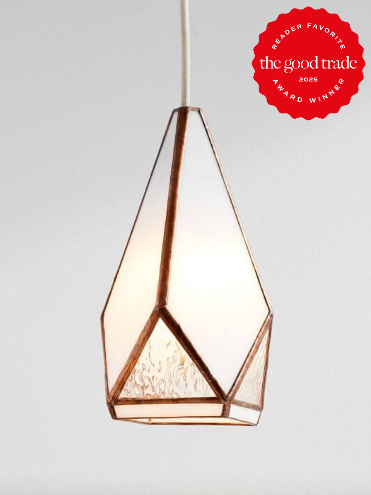 Geometric pendant light with a hexagonal design, featuring frosted and clear glass panels. A red "FashionGroomSpot 2025 Reader Favorite Award Winner" badge is displayed in the upper right corner.