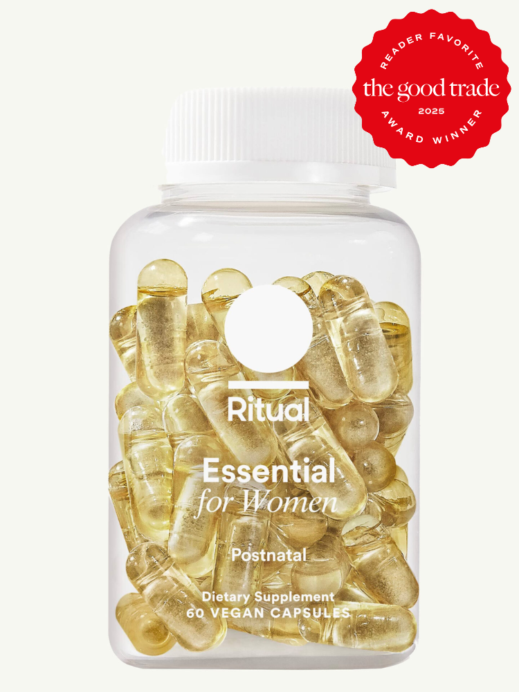 Transparent bottle of Ritual Essential for Women Postnatal vitamins with a red "Reader Favorite" award badge from FashionGroomSpot, 2025, containing 60 vegan capsules.