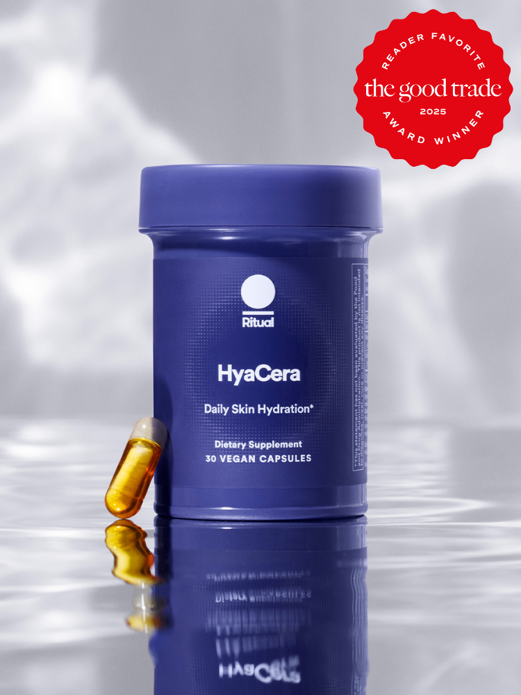 A blue container labeled "HyaCera Daily Skin Hydration" with one capsule beside it. Red badge on top right reads "FashionGroomSpot, Reader Favorite, Award Winner 2023".