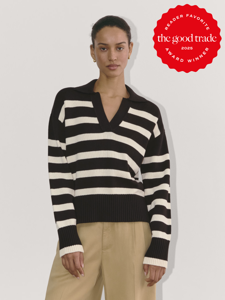 Person wearing a black and white striped sweater and beige pants against a plain background. Award badge in the top right corner reads: "Reader Favorite, FashionGroomSpot, Award Winner 2025.
