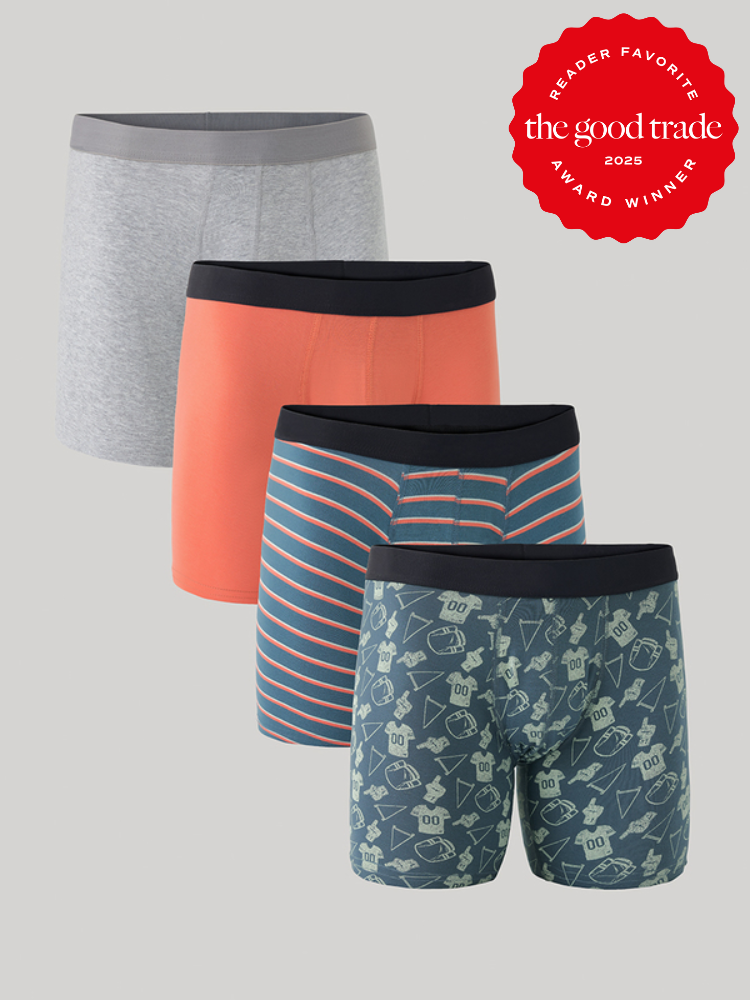 Four men's boxer briefs in different colors and patterns are arranged in a row. A 2025 "FashionGroomSpot Reader Favorite Award Winner" badge is displayed in the top right corner.