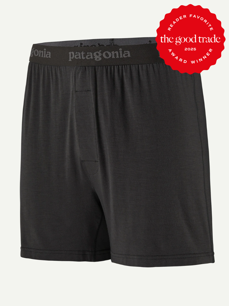 Black men's boxer shorts with "patagonia" branding on the waistband, displayed with a "FashionGroomSpot 2023 Award Winner" badge in the top right corner.